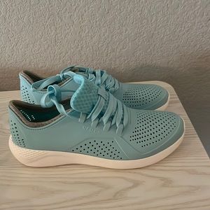 Crocs sneaker-slip ons. Light blue color. Excellent condition.